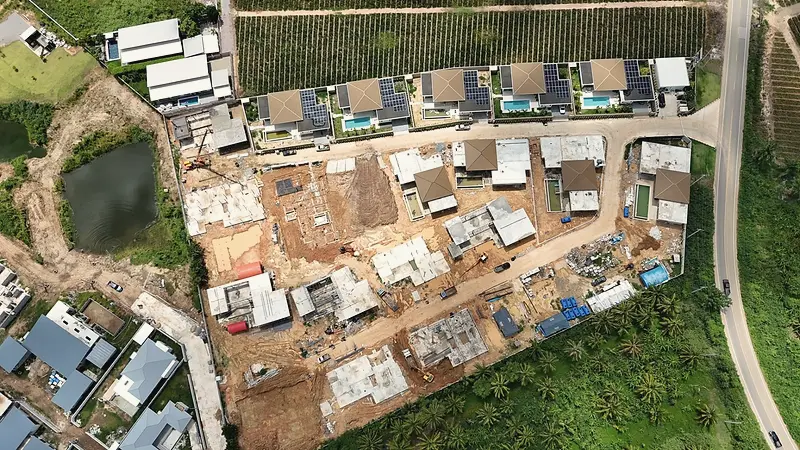 Aerial view of the estate: finished Phase One homes and new villas under construction