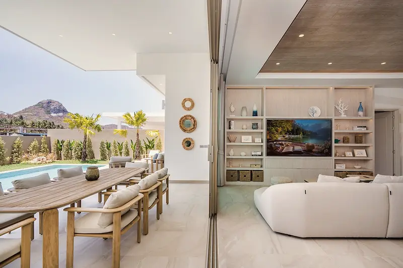 Open-plan living beside the pool